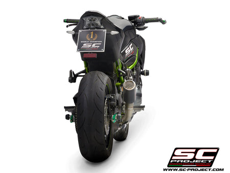 Picture of CR-T carbon fibre exhaust, with stoneguard grid