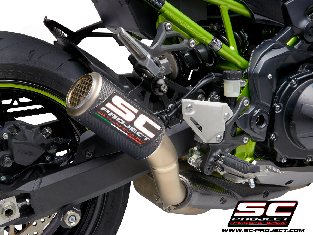 Picture of CR-T carbon fibre exhaust, with stoneguard grid
