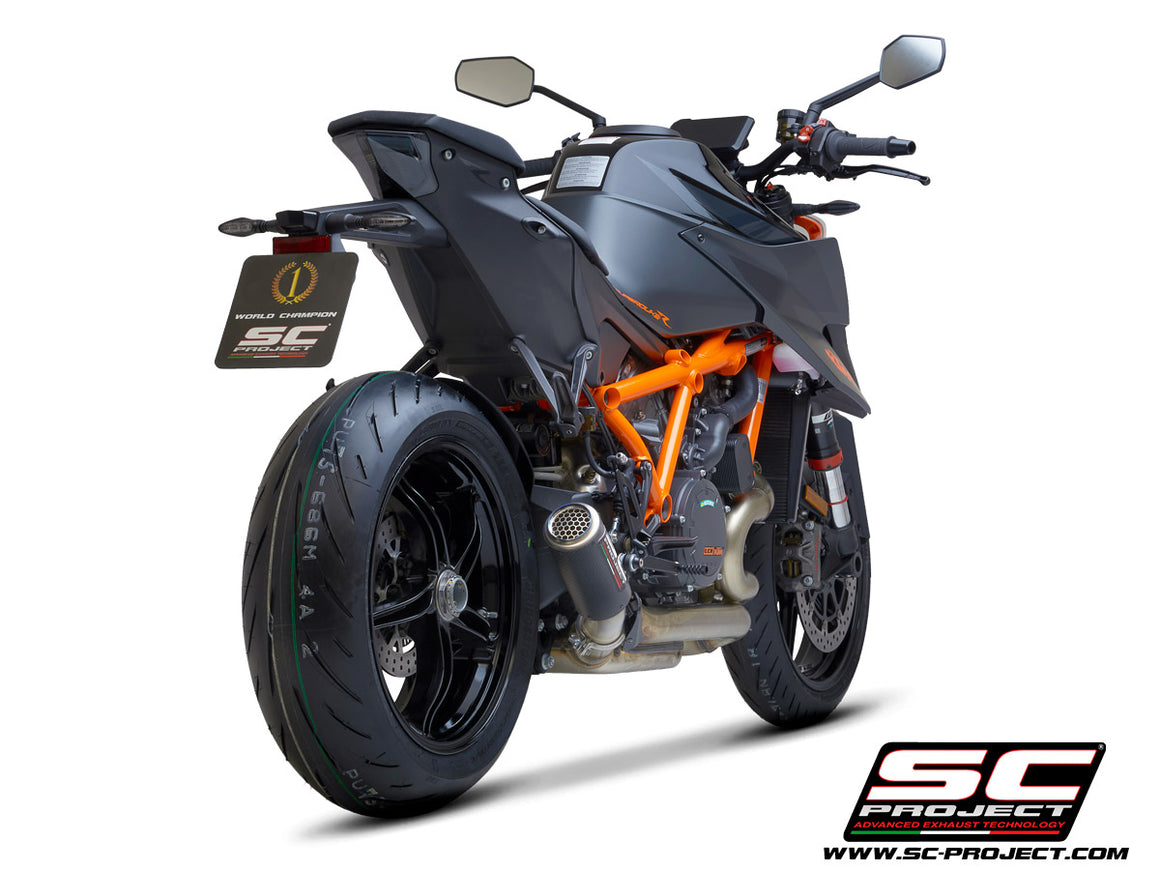 Picture of CR-T carbon fibre exhaust, with stoneguard grid