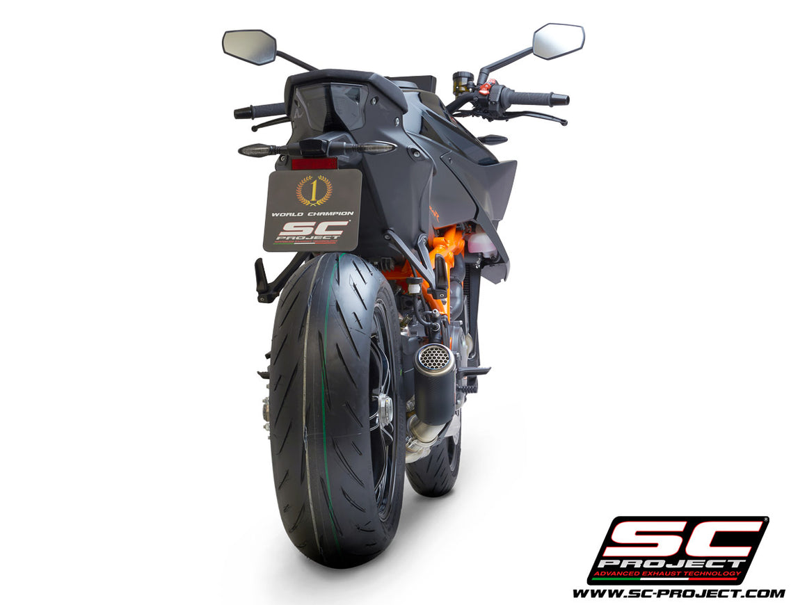 Picture of CR-T carbon fibre exhaust, with stoneguard grid