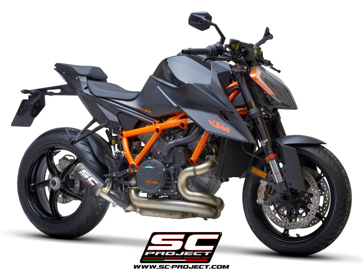 Picture of CR-T carbon fibre exhaust, with stoneguard grid