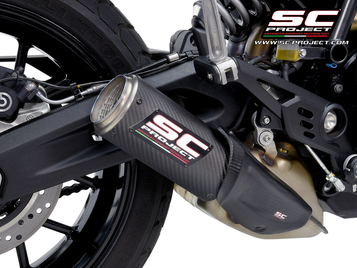 Picture of CR-T carbon fibre exhaust, with stoneguard grid