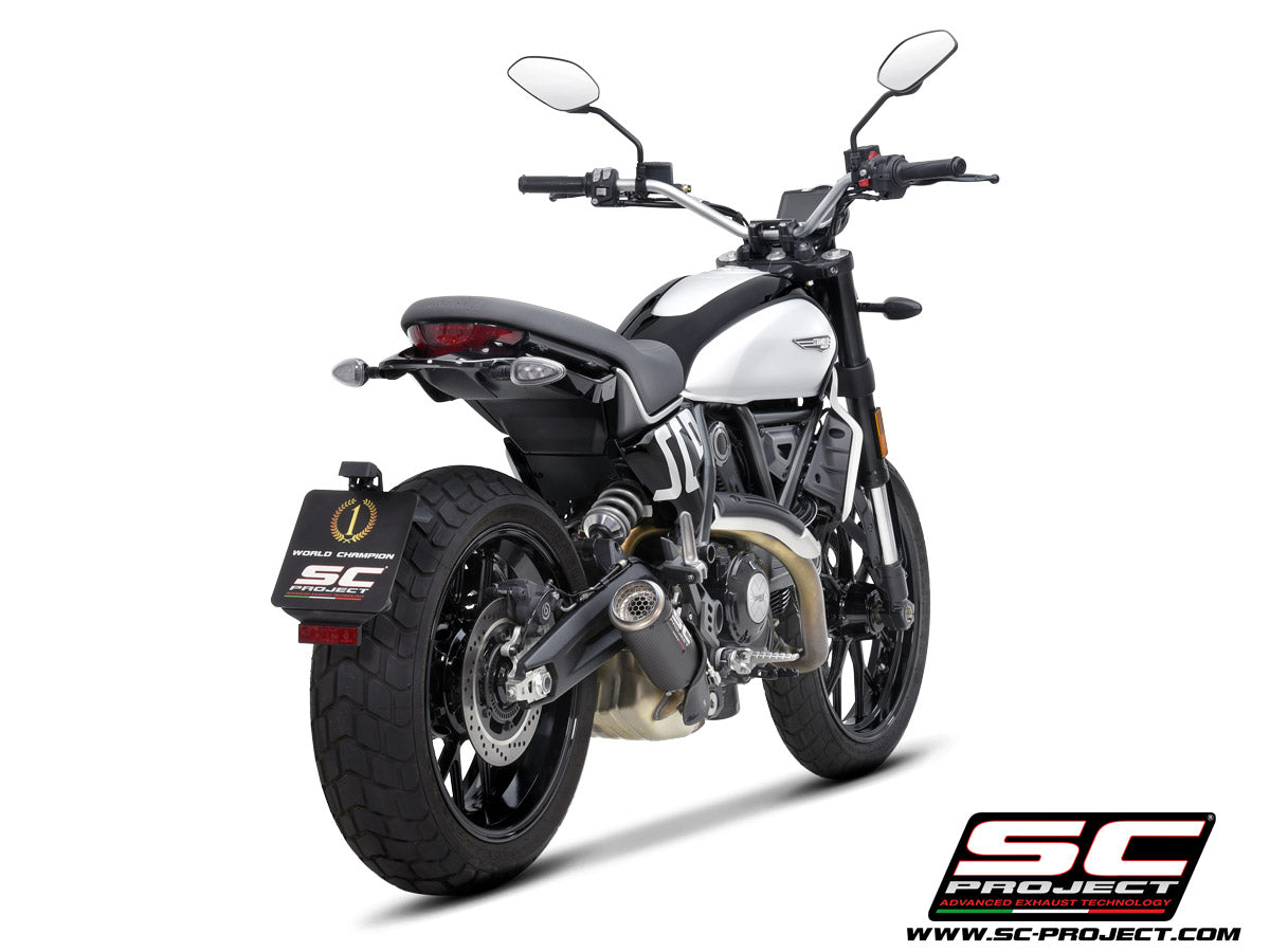 Picture of CR-T carbon fibre exhaust, with stoneguard grid