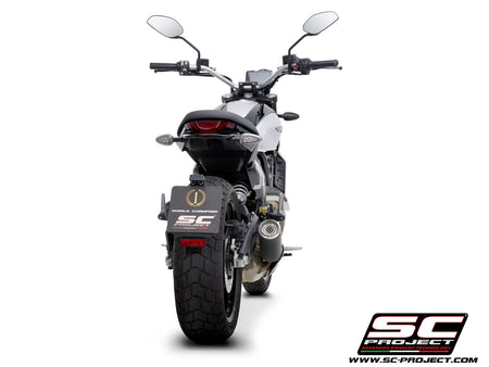 Picture of CR-T carbon fibre exhaust, with stoneguard grid
