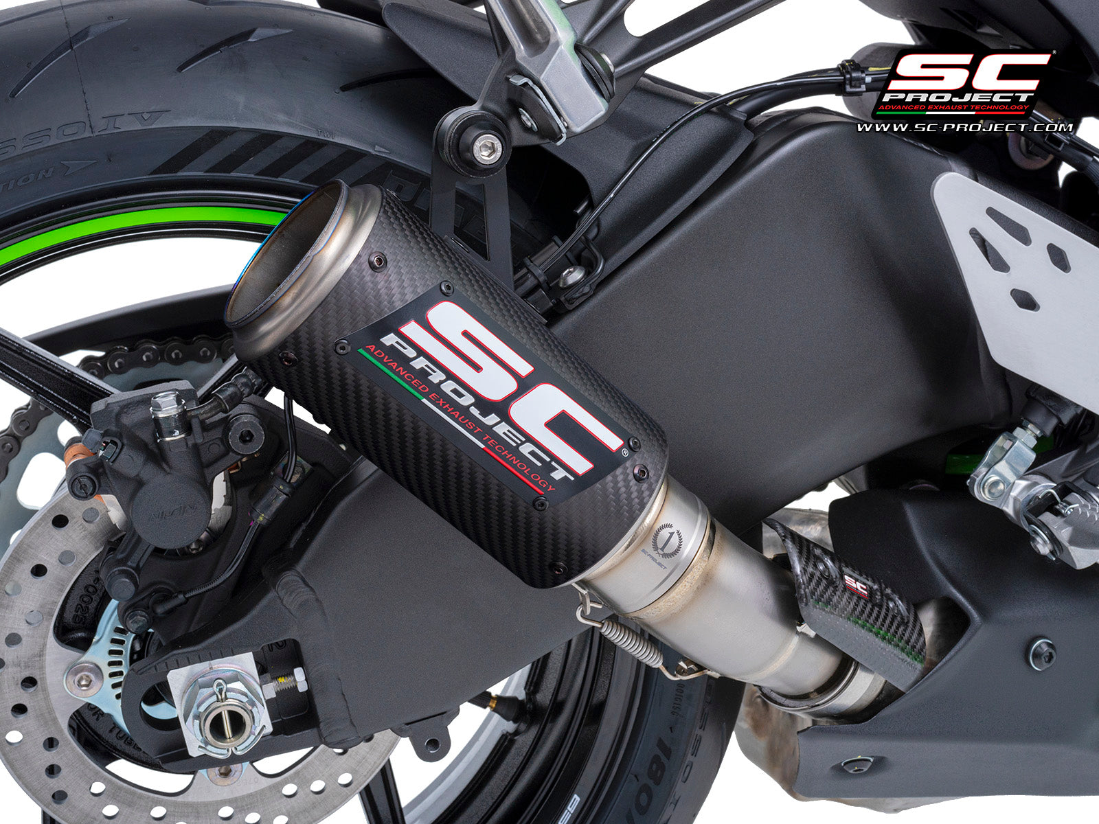 Kawasaki ZX-6R 2024 with SC-Project CR-T carbon exhaust, 3/4 rear view
