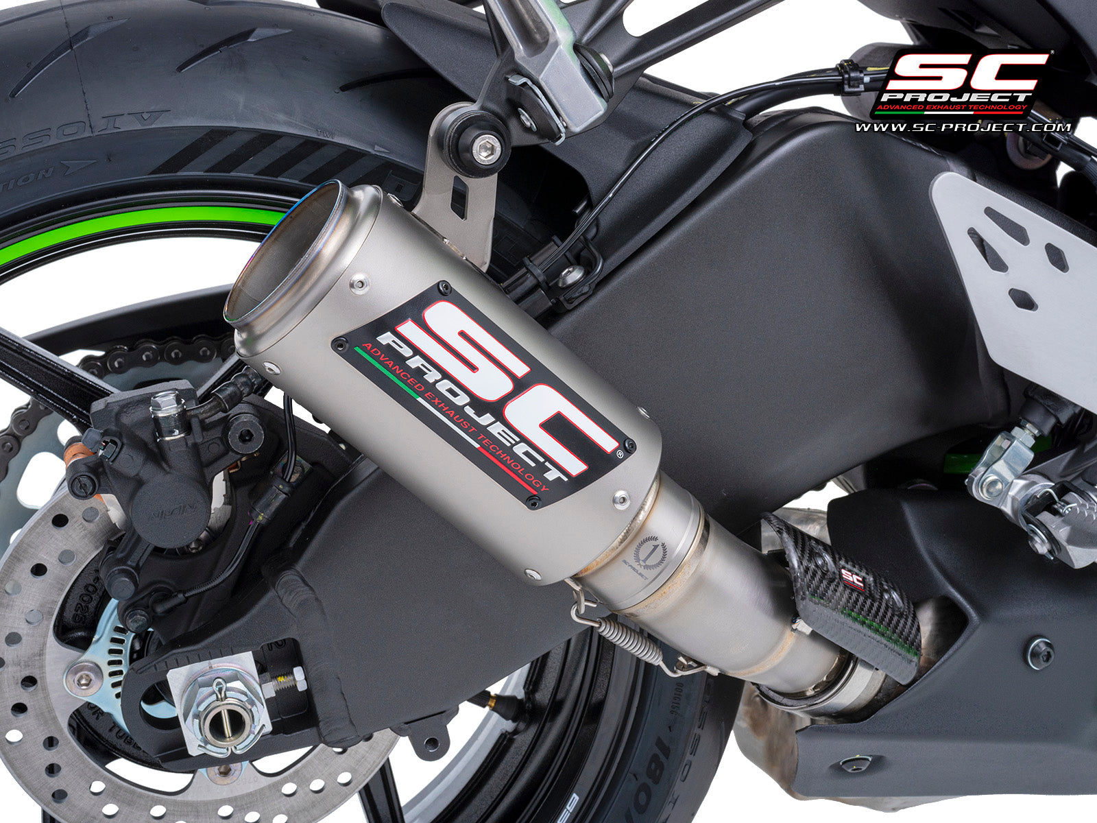 Kawasaki ZX-6R 2024 with SC-Project CR-T titanium exhaust, 3/4 rear view