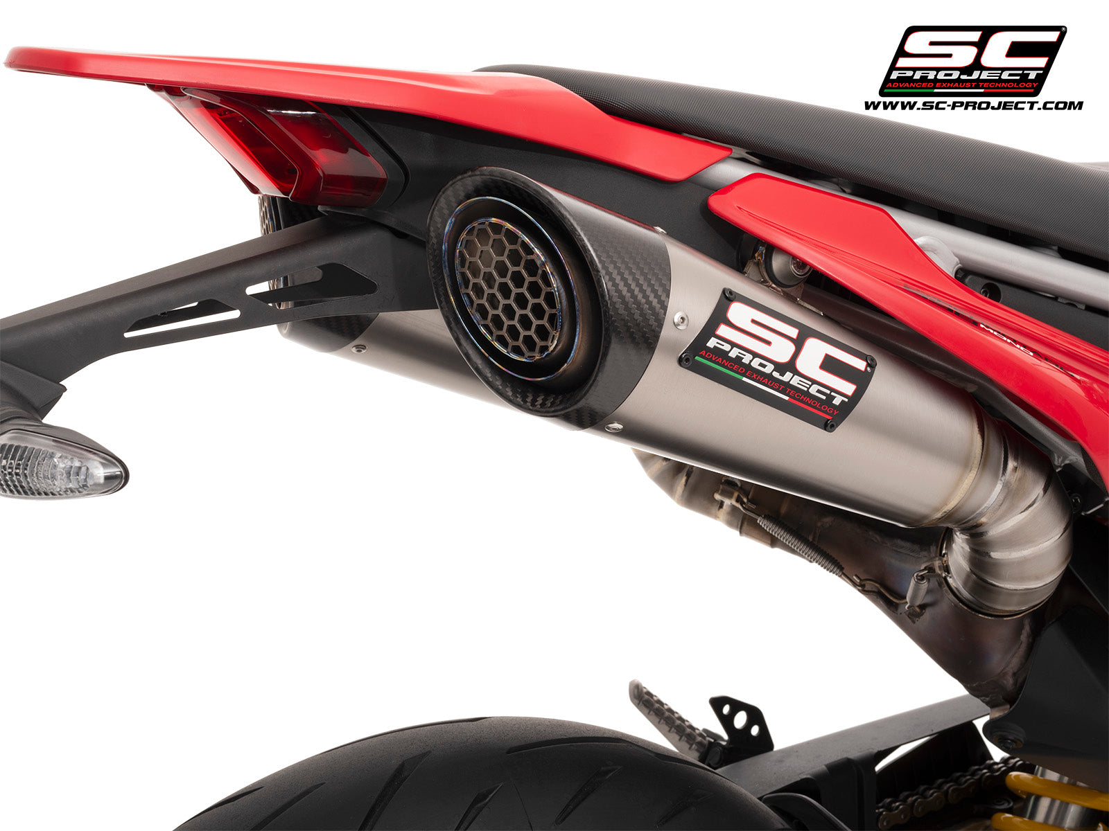 Ducati Hypermotard 698 MONO (2024) with SC-Project S1 titanium exhaust, with stoneguard grid, 3/4 rear view