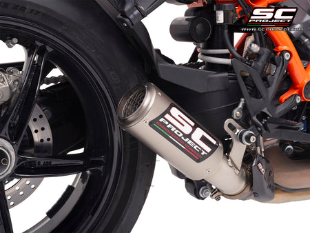 KTM 1390 Super Duke R (2024) with SC-Project CR-T titanium exhaust, with stoneguard grid, 3/4 rear view