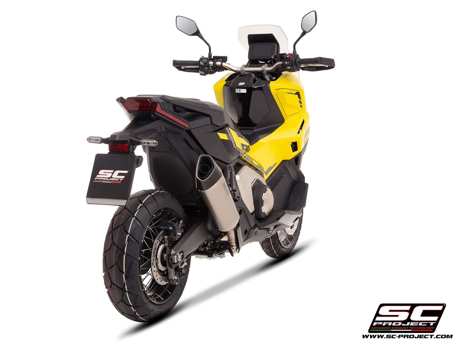 HONDA X ADV 750 with SC-Project SC1-R titanium exhaust, 3/4 rear view