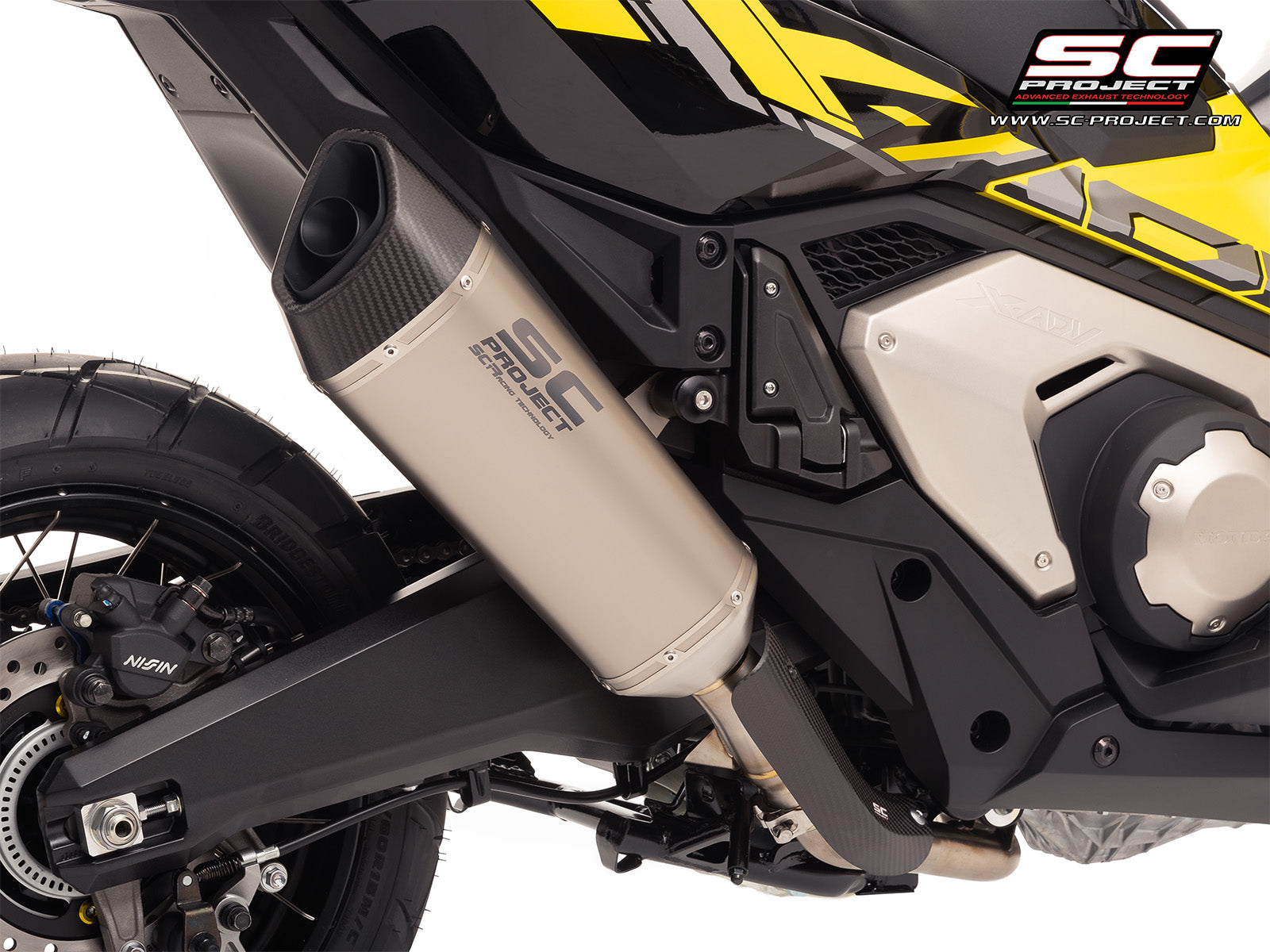 HONDA X ADV 750 with SC-Project SC1-R titanium exhaust, 3/4 rear view
