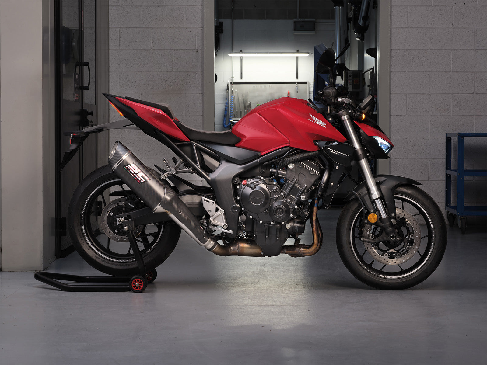 Honda CB1000 Hornet with SC-Project SC1-R GT carbon exhaust, 3/4 rear view