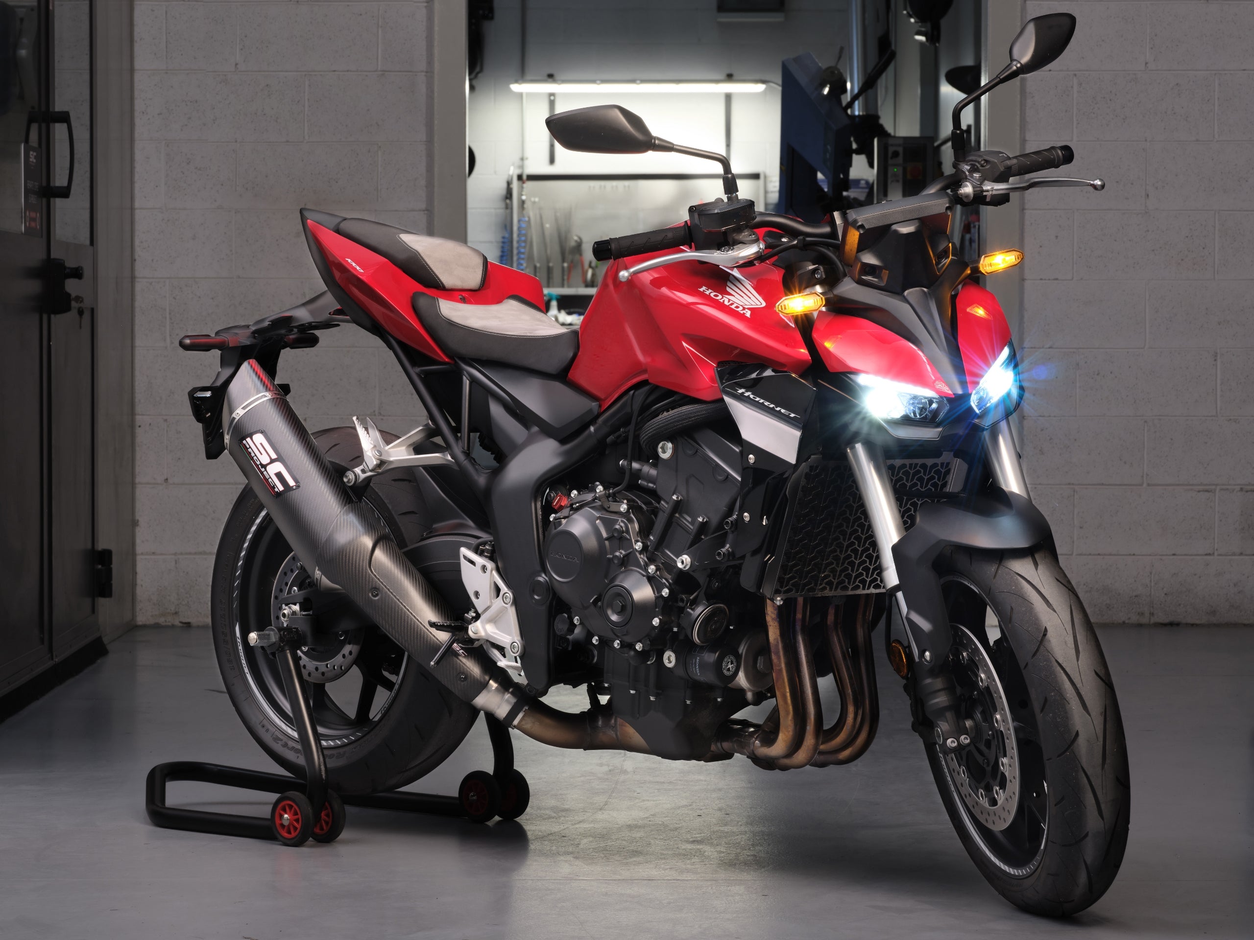 Honda CB1000 Hornet with SC-Project SC1-R GT carbon exhaust, 3/4 rear view