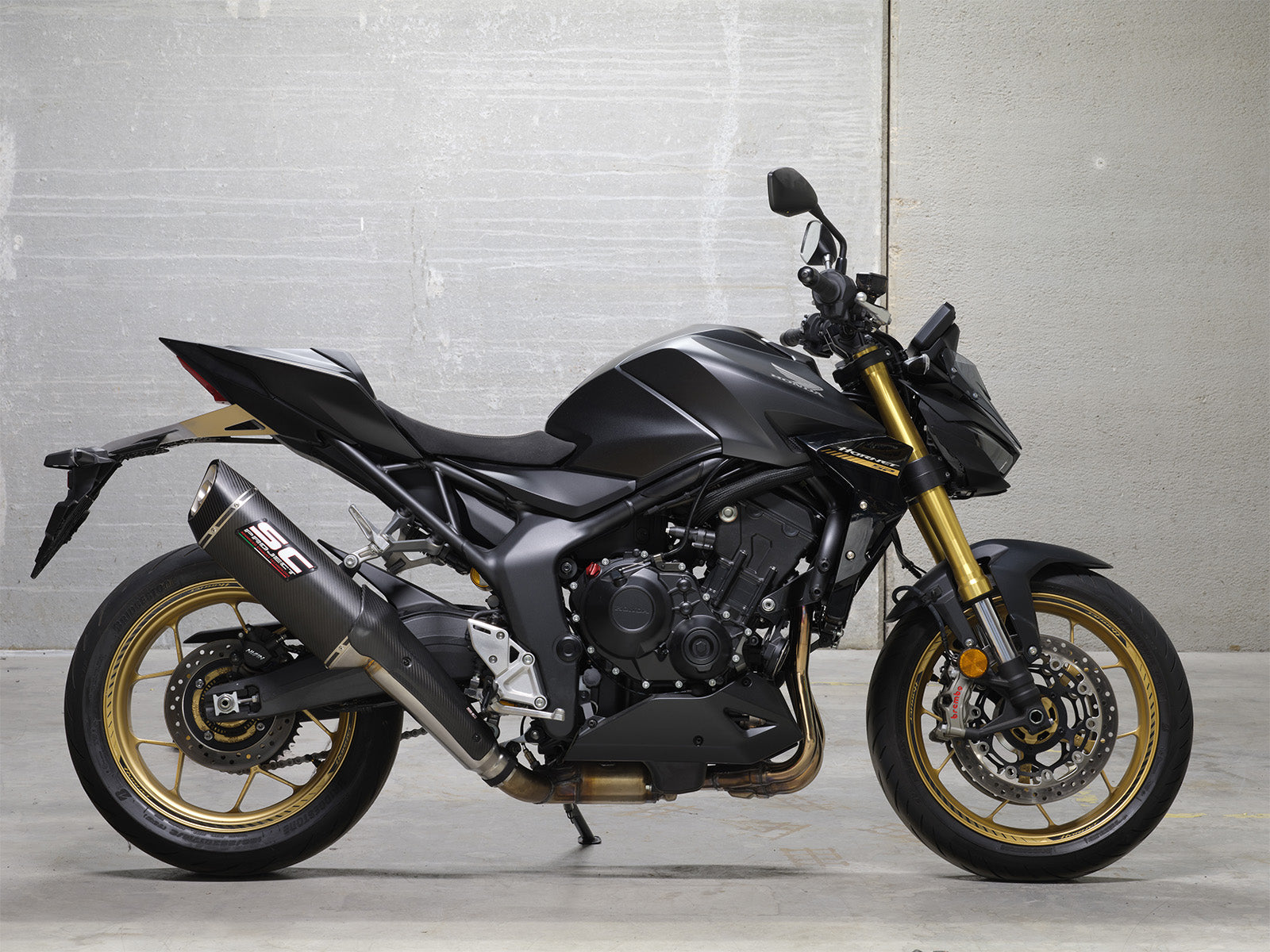 Honda CB1000 Hornet SP with SC-Project SC1-R GT carbon exhaust, 3/4 rear view