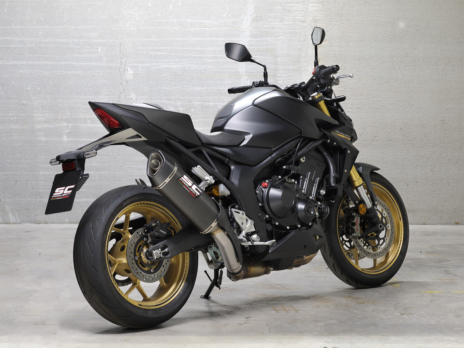 Honda CB1000 Hornet SP with SC-Project SC1-R GT carbon exhaust, 3/4 rear view