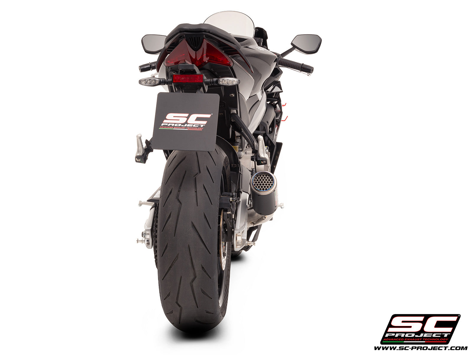 Aprilia RS 660 with SC-Project Stainless steel full exhaust system, with CR-T carbon exhaust, with stoneguard grid, 3/4 rear view