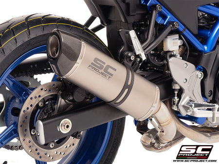 Suzuki SV650 M.Y. 2025 with SC-Project Oval titanium exhaust, 3/4 rear view