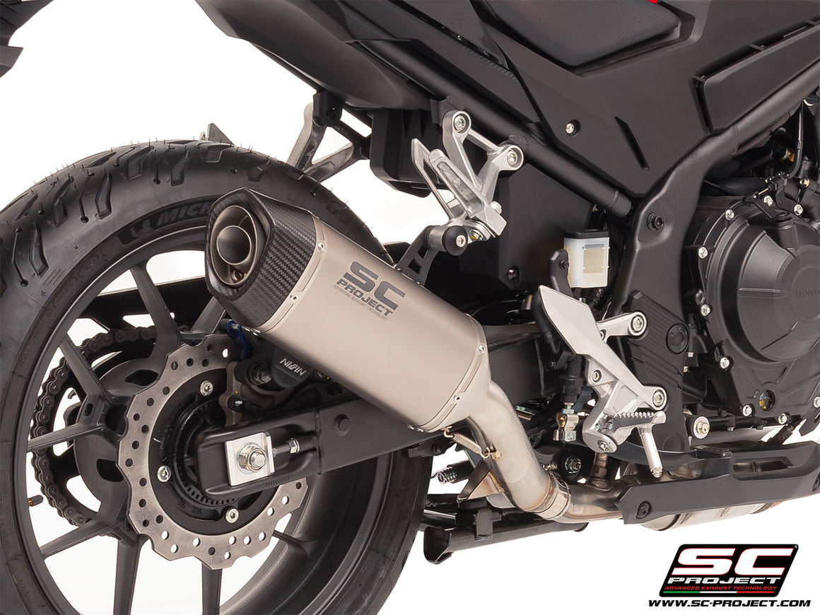 Honda CB500 Hornet with SC-Project SC1-S titanium exhaust, 3/4 rear view