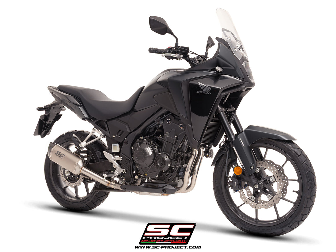 Honda NX500 with SC-Project SC1-S titanium exhaust, 3/4 rear view