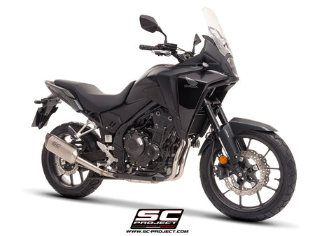 Honda NX500 with SC-Project SC1-S titanium exhaust, 3/4 rear view