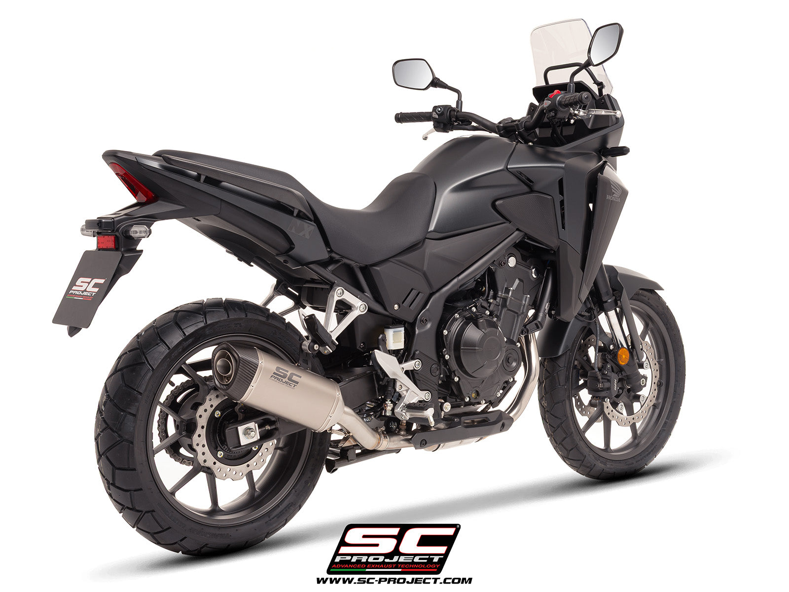 Honda NX500 with SC-Project SC1-S titanium exhaust, 3/4 rear view