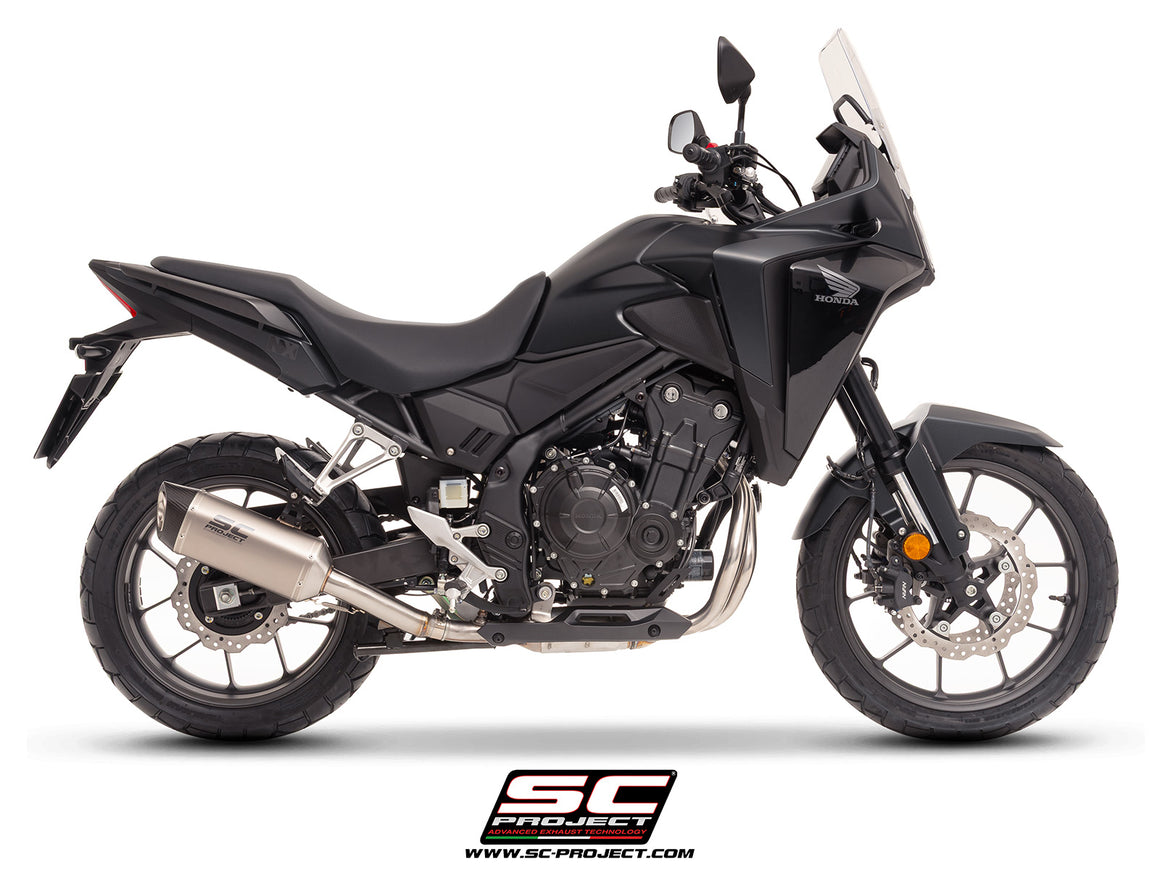 Honda NX500 with SC-Project SC1-S titanium exhaust, 3/4 rear view