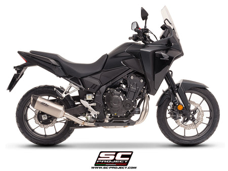 Honda NX500 with SC-Project SC1-S titanium exhaust, 3/4 rear view