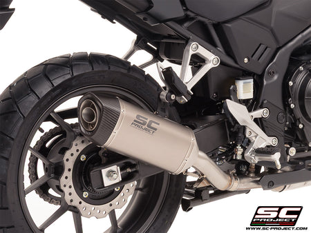 Honda NX500 with SC-Project SC1-S titanium exhaust, 3/4 rear view