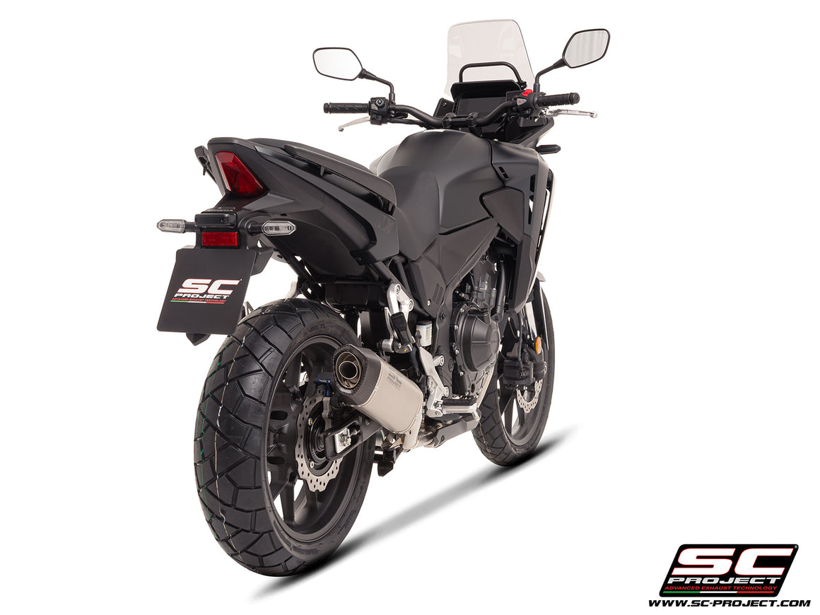 Honda NX500 with SC-Project SC1-S titanium exhaust, 3/4 rear view