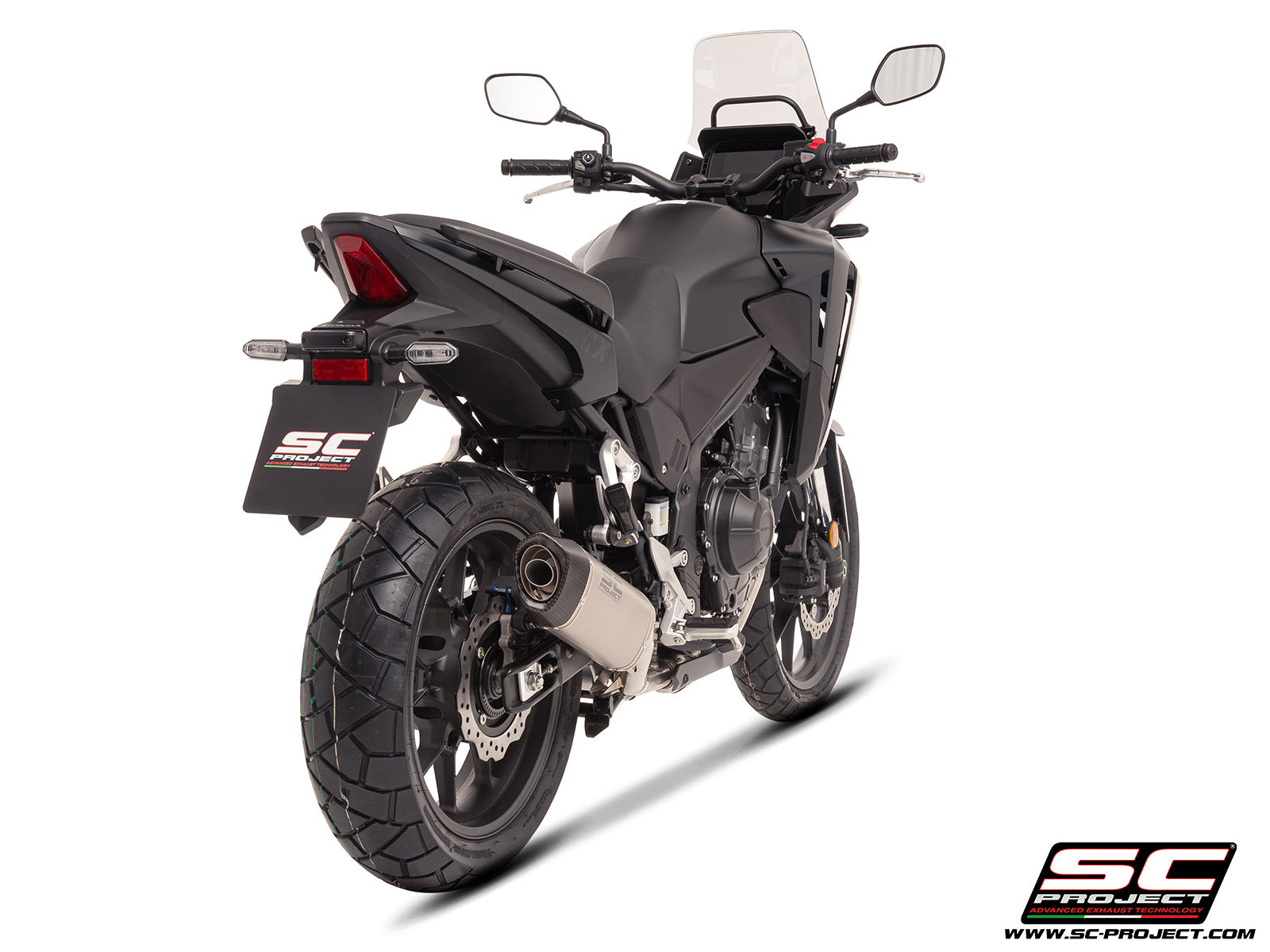 Honda NX500 with SC-Project SC1-S titanium exhaust, 3/4 rear view