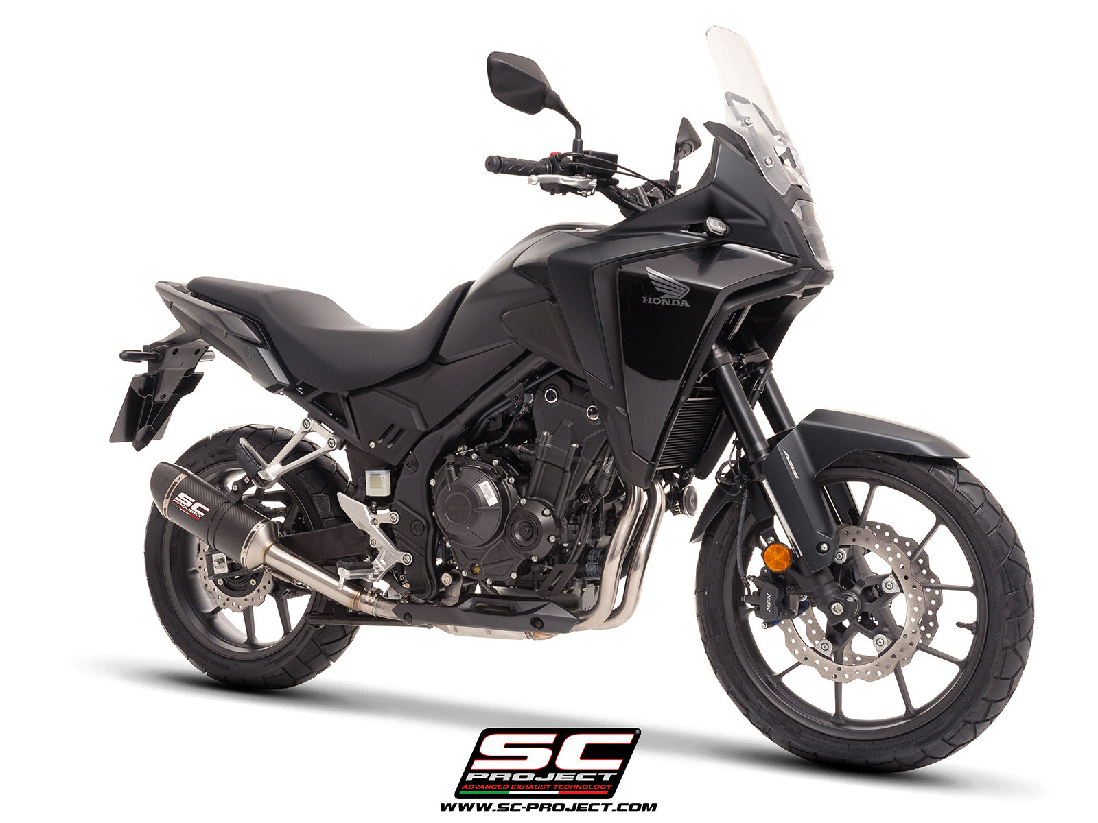 Honda NX500 with SC-Project Ovaal carbon exhaust, 3/4 rear view