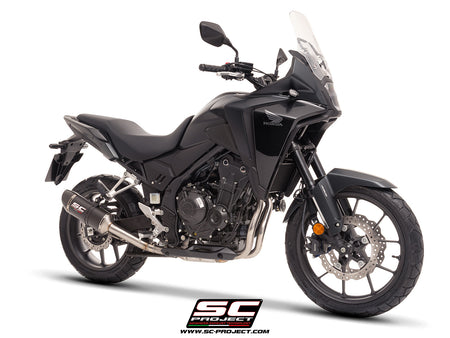 Honda NX500 with SC-Project Ovaal carbon exhaust, 3/4 rear view