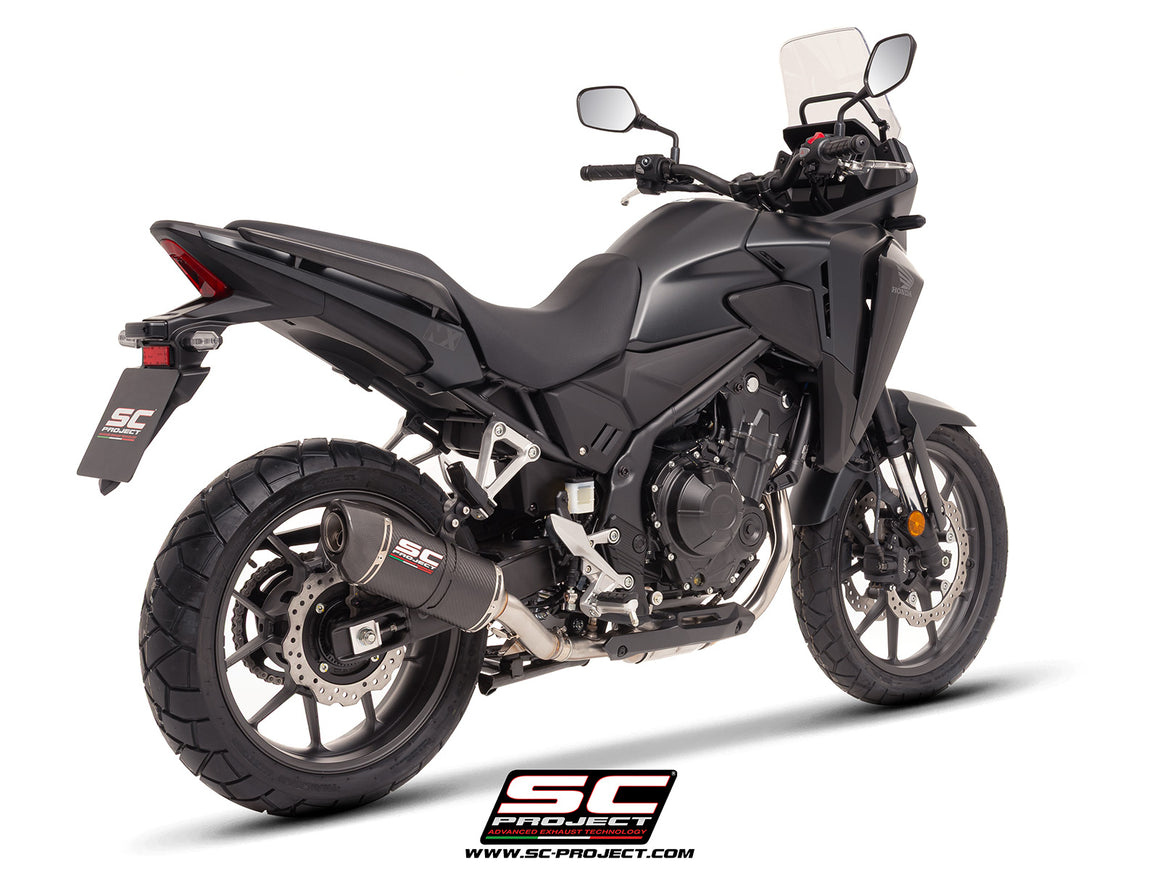 Honda NX500 with SC-Project Ovaal carbon exhaust, 3/4 rear view