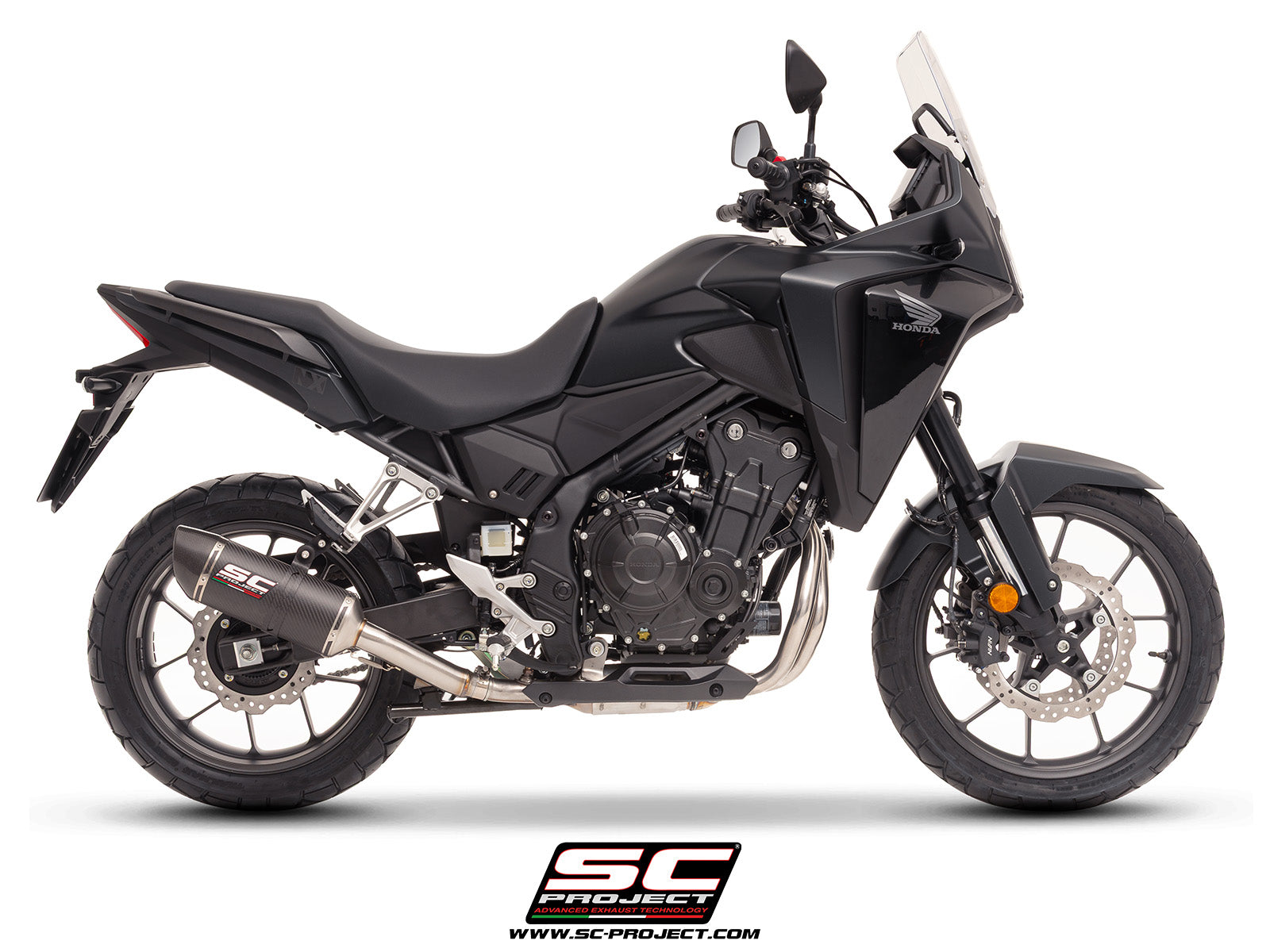 Honda NX500 with SC-Project Ovaal carbon exhaust, 3/4 rear view
