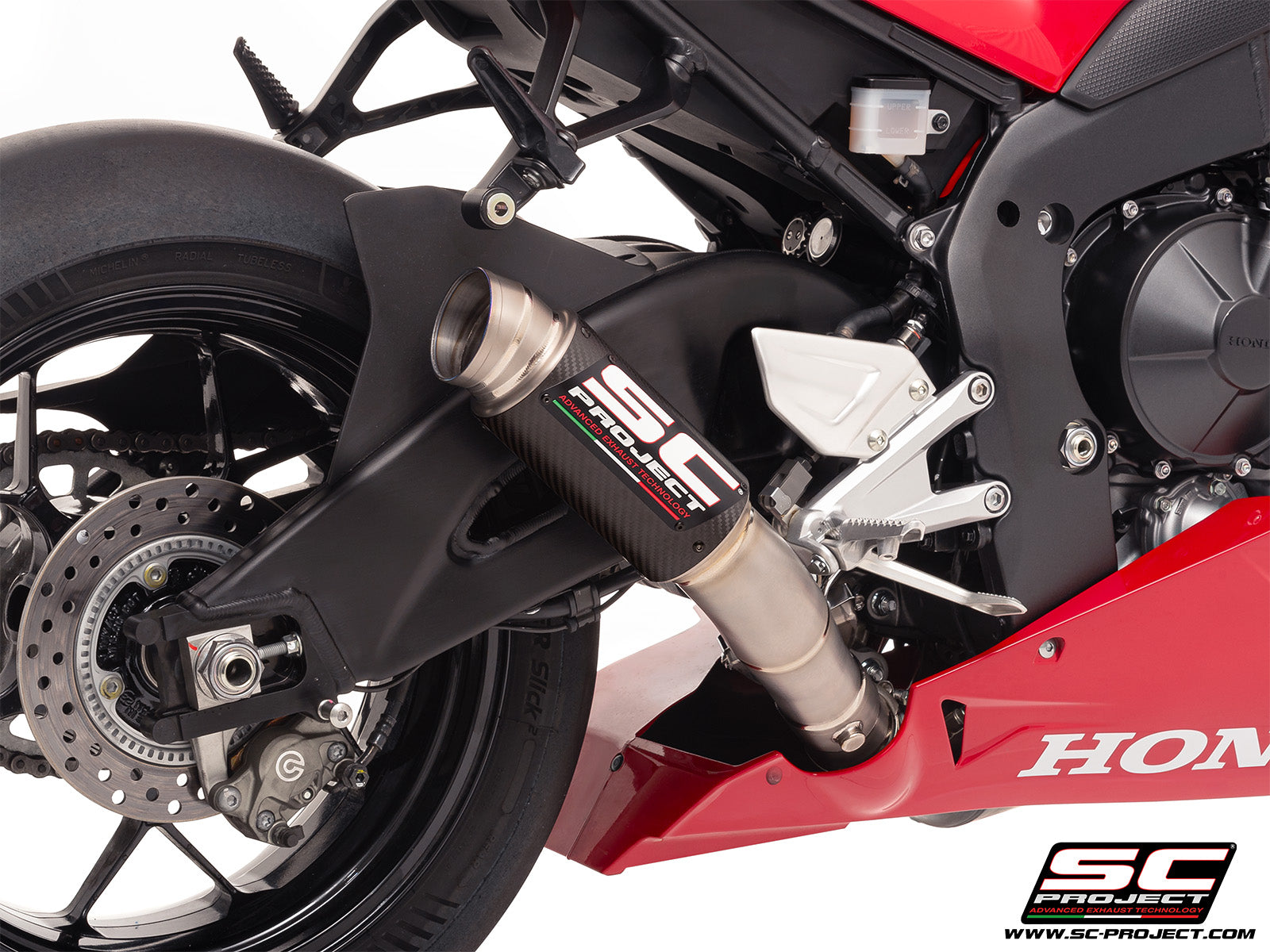 Honda CBR1000RR-R 2025 with SC-Project GP70-R carbon exhaust, 3/4 rear view