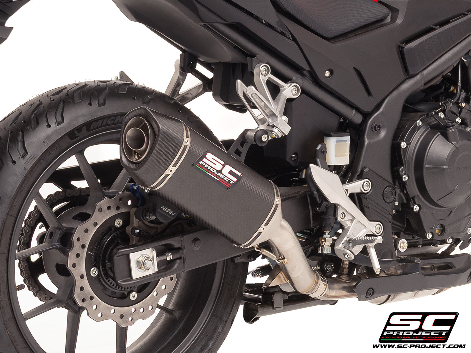 Honda CB500 Hornet with SC-Project SC1-S carbon exhaust, 3/4 rear view