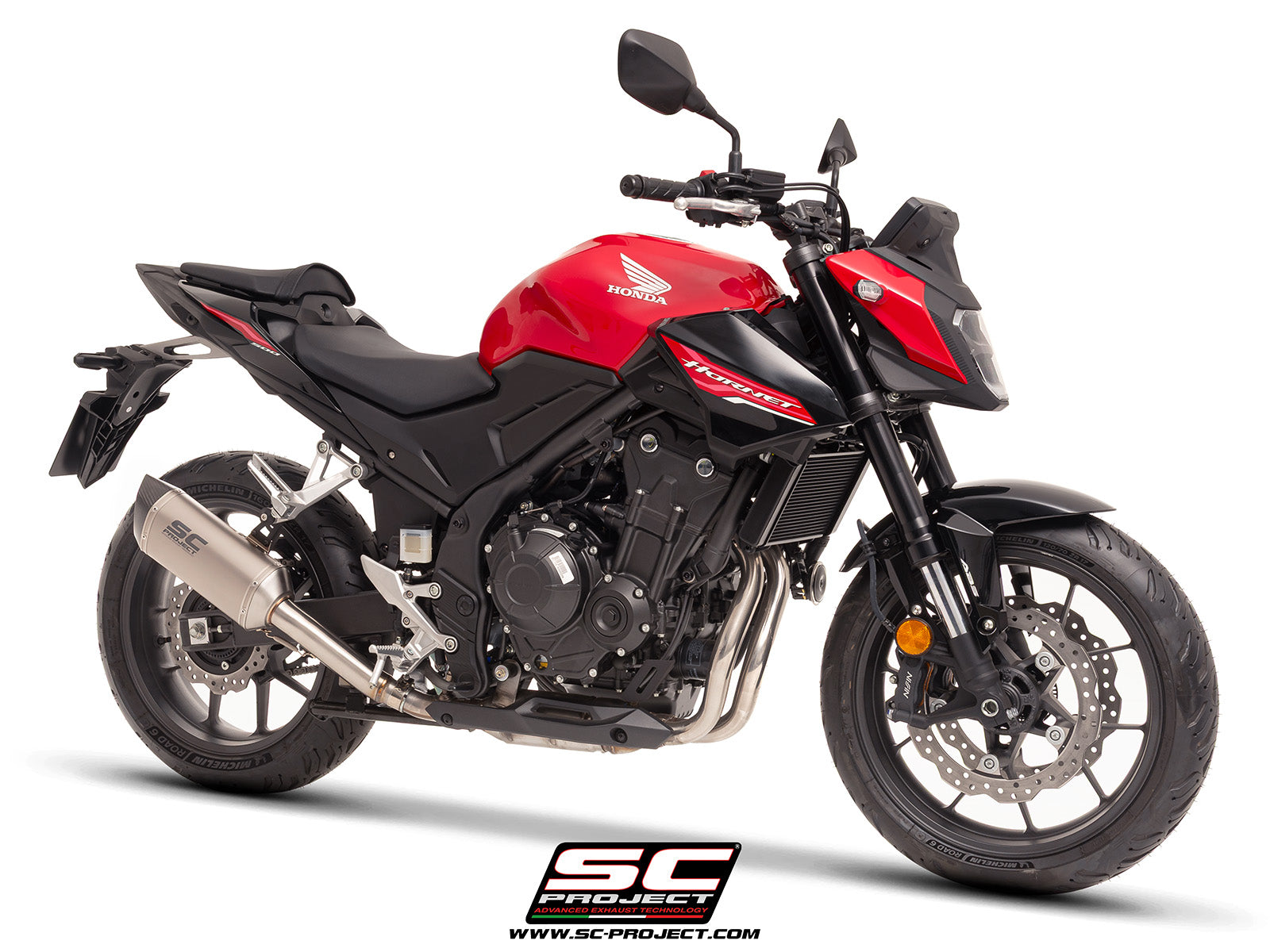 Honda CB500 Hornet with SC-Project SC1-S titanium exhaust, 3/4 rear view