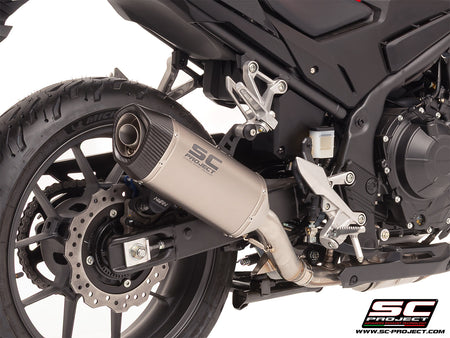 Honda CB500 Hornet with SC-Project SC1-S titanium exhaust, 3/4 rear view