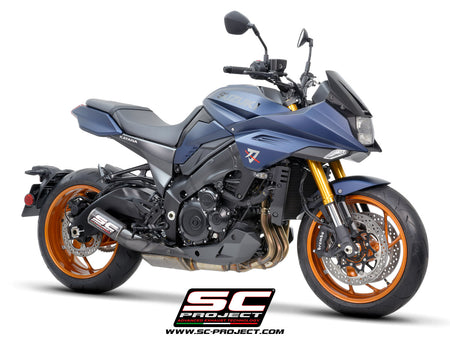 Picture of CR-T carbon fibre exhaust, with stoneguard grid