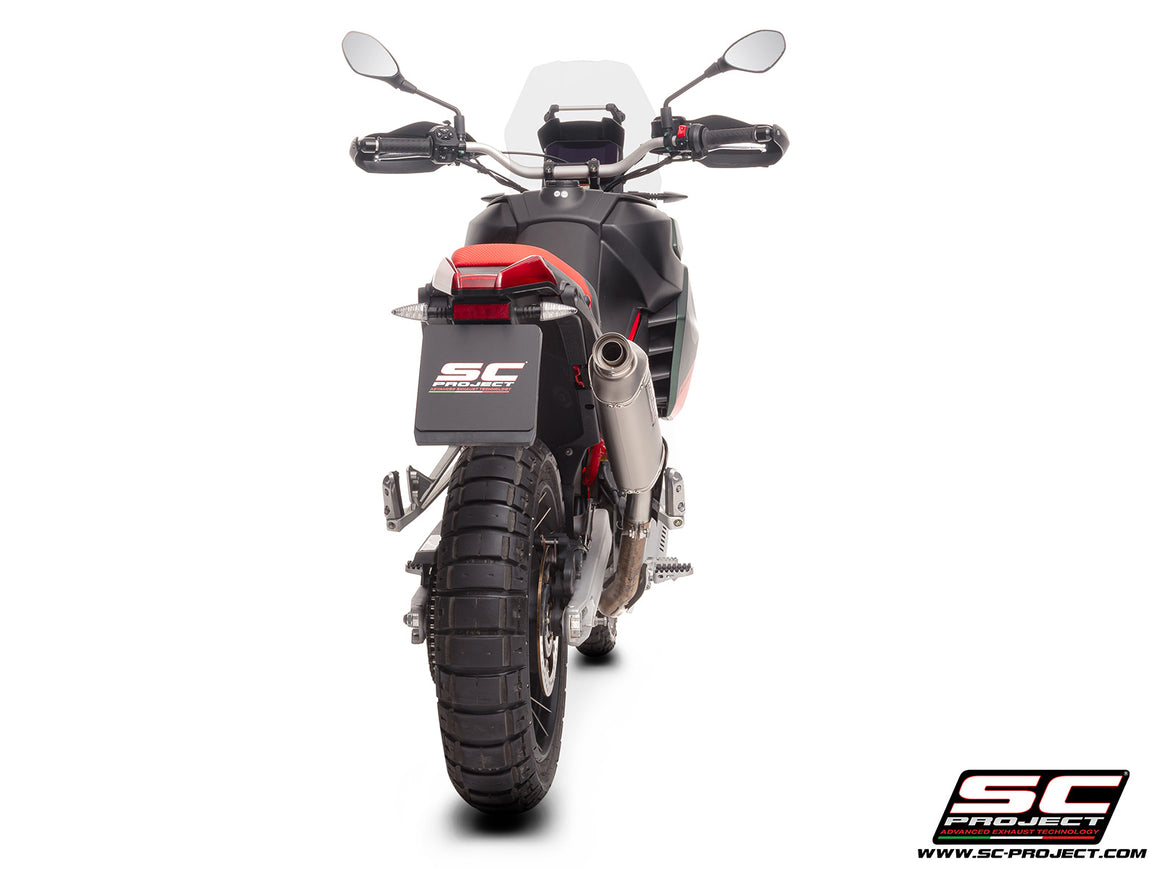 Aprilia Tuareg 660 2025 with SC-Project Rally Raid titanium exhaust, 3/4 rear view