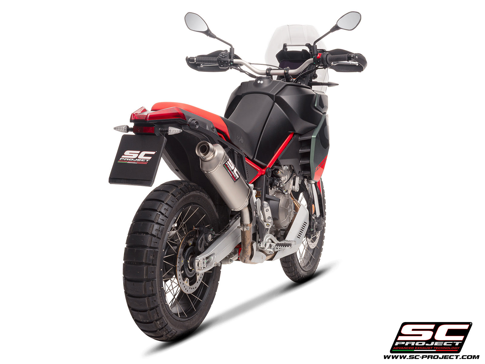 Aprilia Tuareg 660 2025 with SC-Project Rally Raid titanium exhaust, 3/4 rear view