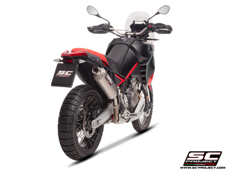 Aprilia Tuareg 660 2025 with SC-Project Rally Raid titanium exhaust, 3/4 rear view