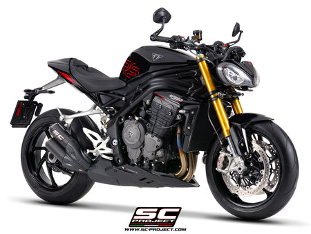 Triumph Speed Triple 1200 RS  with SC-Project TWIN CR-T carbon fibre exhaust, with stoneguard grid, 3/4 rear view