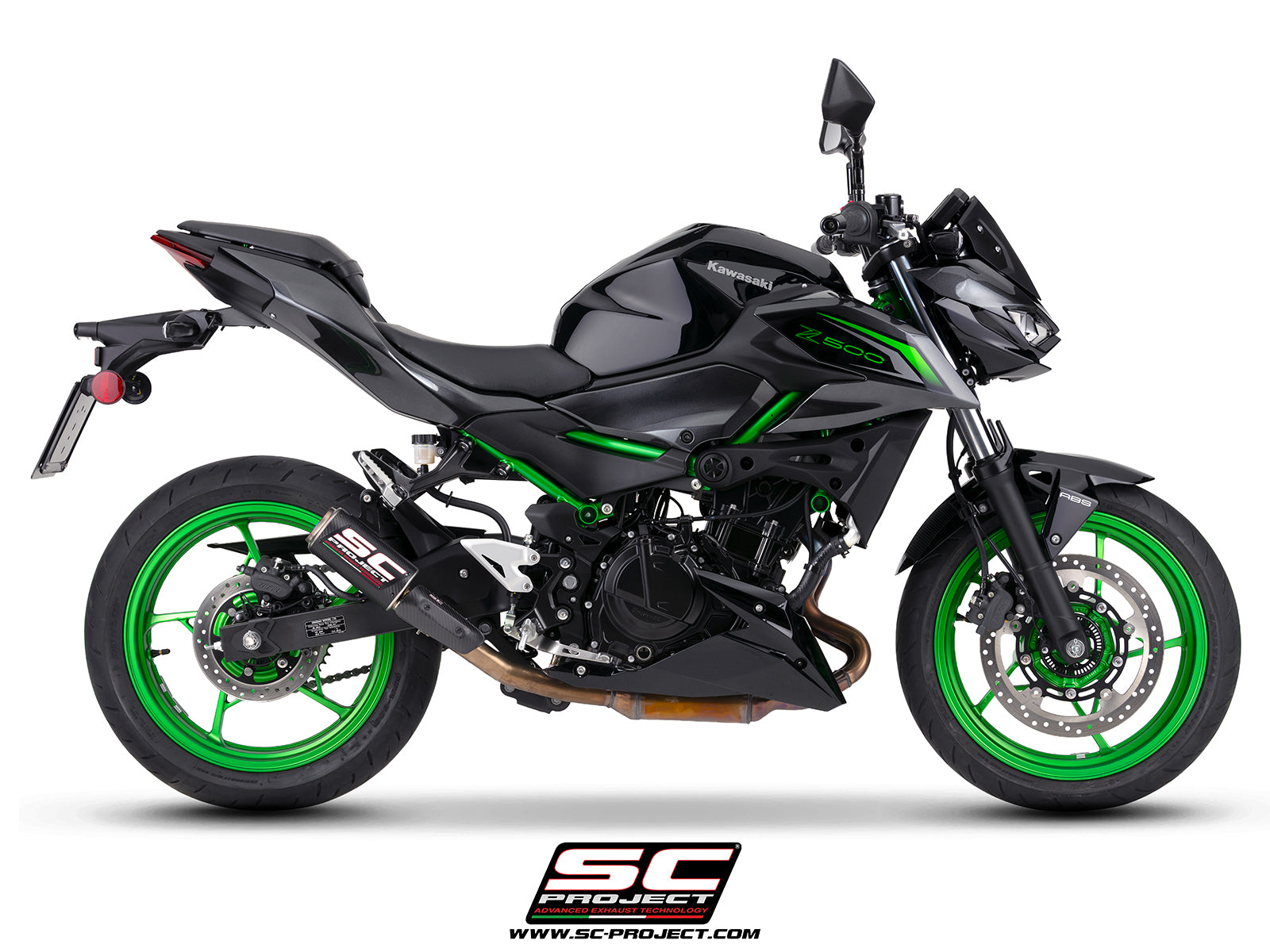 Kawasaki Z500 with SC-Project CR-T carbon fibre exhaust, with stoneguard grid, 3/4 rear view