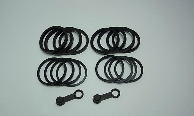TOURM REPAIR KIT FRONT BRAKE CALIPER TOURMAX Remklauw keerring set voorzijde Honda