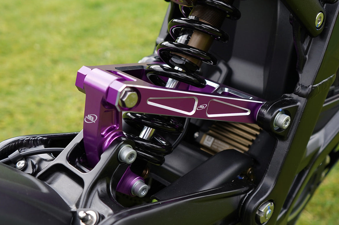 SUR-RON LIGHT BEE 2018-2024 AS3 UPGRADED BILLET ALUMINIUM REAR SUSPENSION LINKAGE ARM TRIANGLE PURPLE