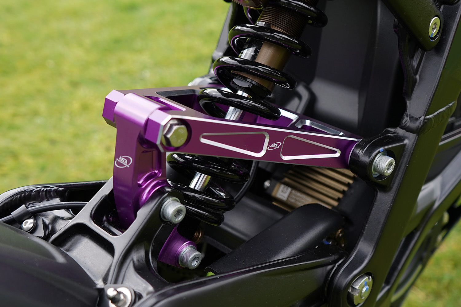 SUR-RON LIGHT BEE 2018-2024 AS3 UPGRADED BILLET ALUMINIUM REAR SUSPENSION LINKAGE ARM TRIANGLE PURPLE